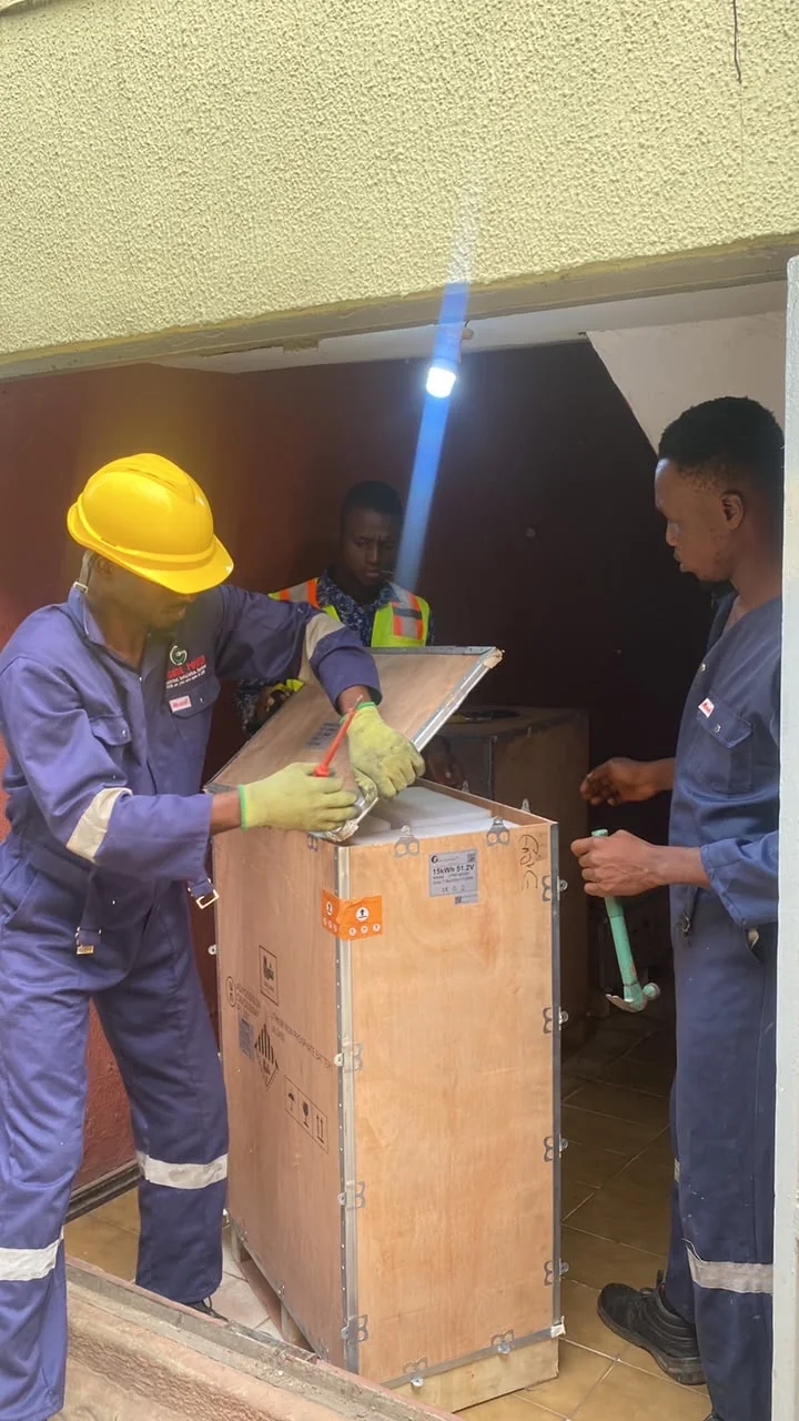 G-Sure Power technicians handling electrical equipment on site